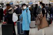 En China cancelan vuelos y extreman las medidas para contener el rebrote de coronavirus